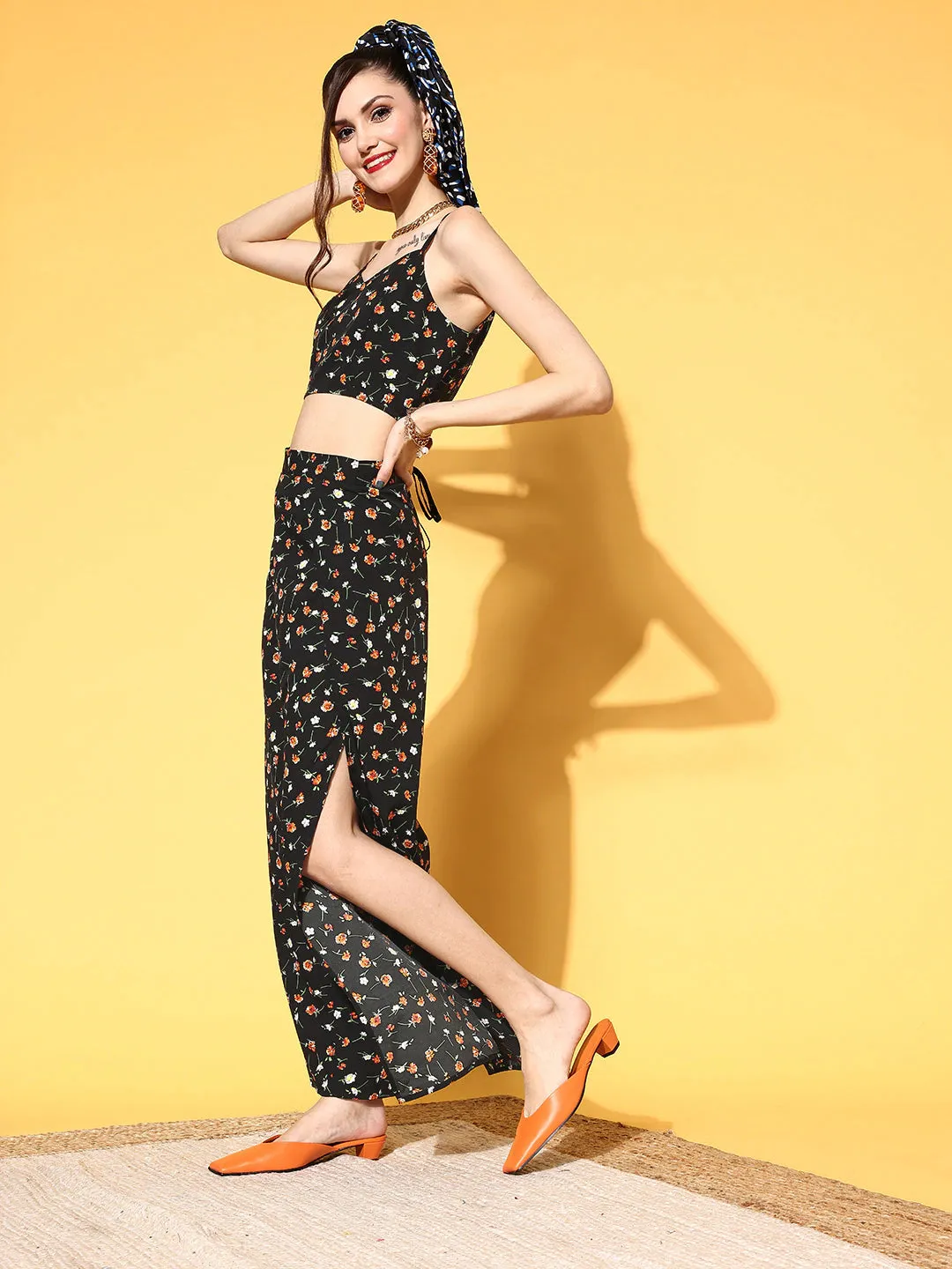 Berrylush Women Black & Orange Floral Printed V-Neck Crop Top & Side-Slit Trousers Co-Ord Set