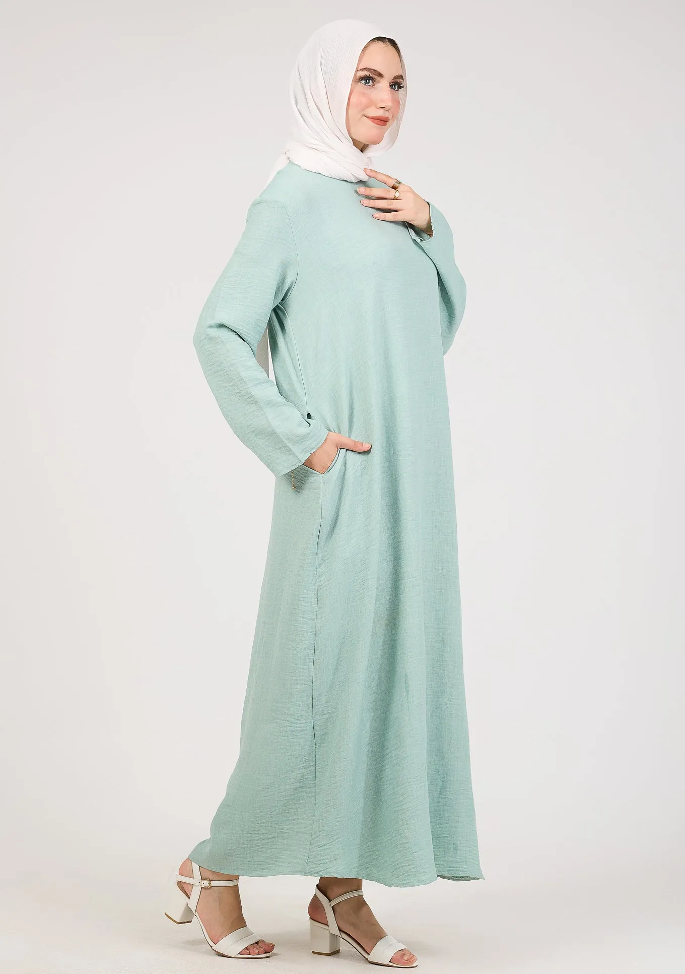 Light Green Kira loose slip dress with pockets in maxi length and with long sleeve