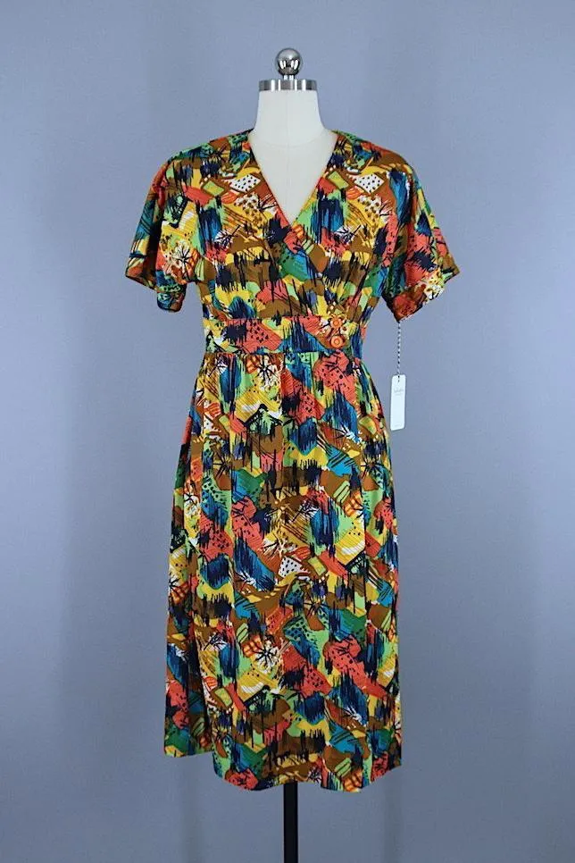 Vintage 1970s Wrap Dress / Orange Abstract Print