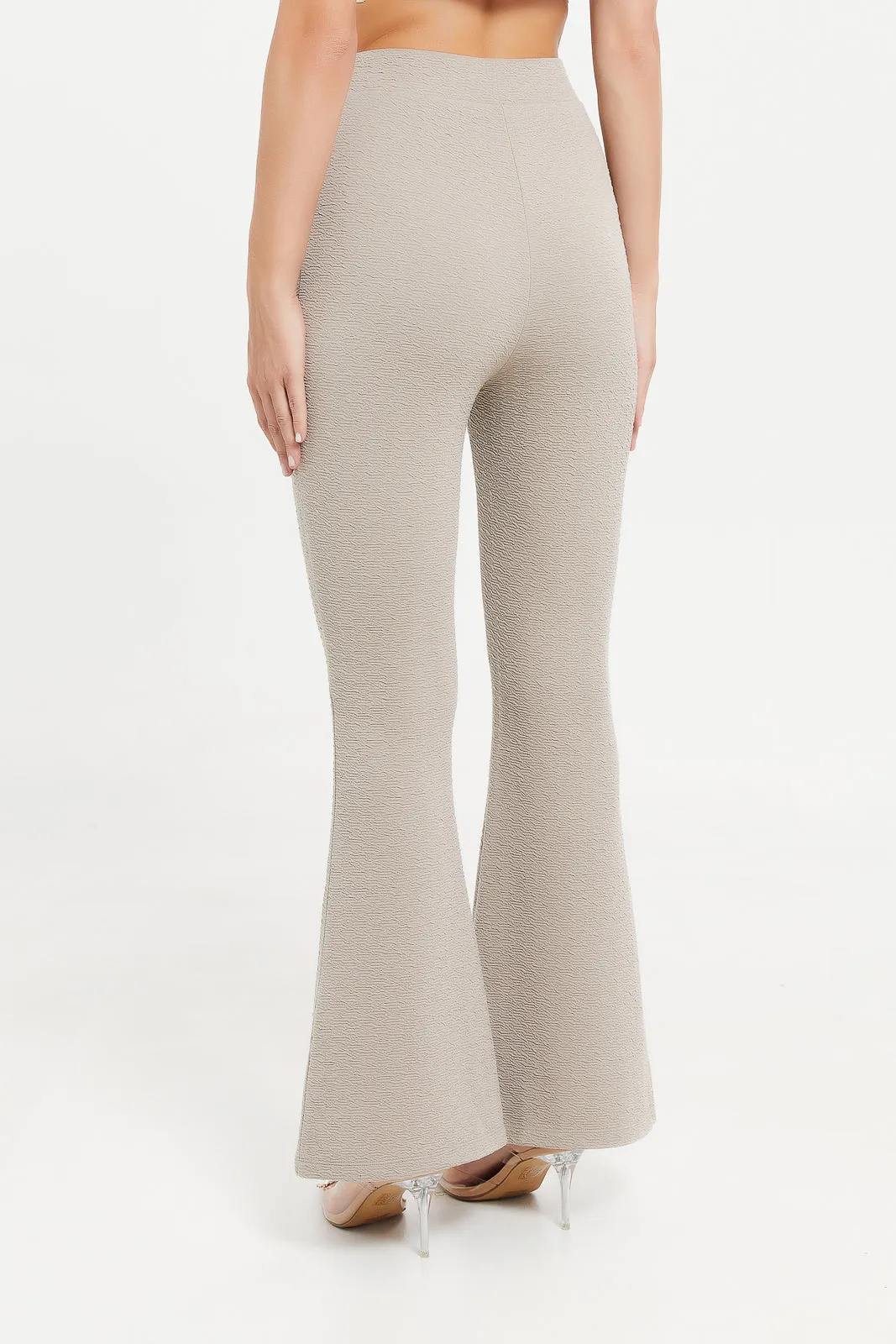 Women Beige Flare Textured Trouser